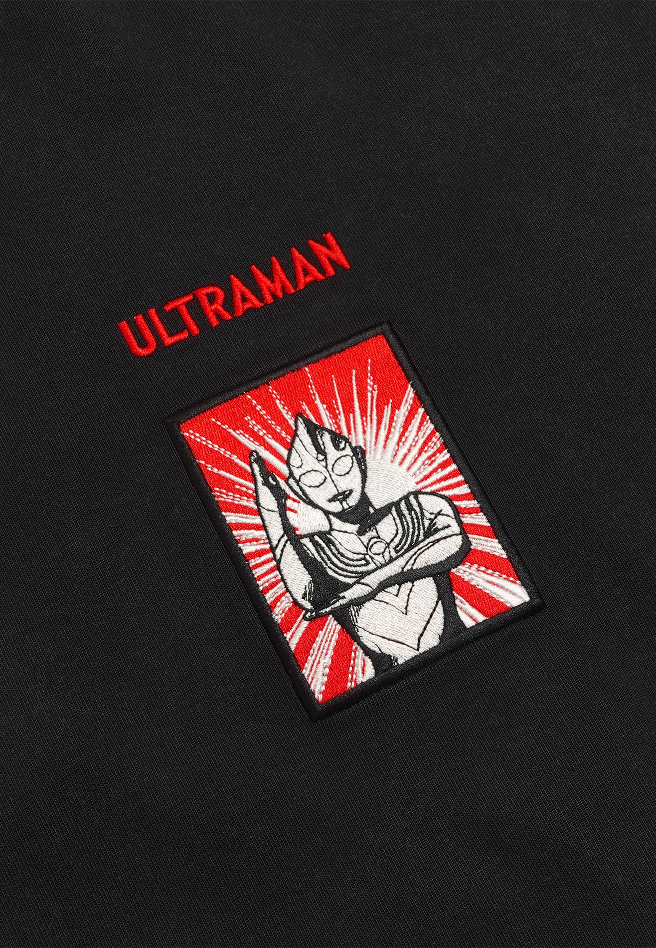 DRUM | ULTRAMAN Hibiscus Icon Stone Wash Oversized Jumper- Black