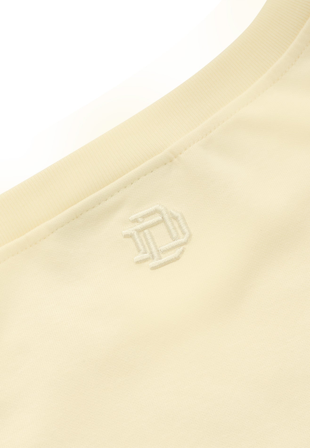 DRUM S. Women Asymmetrical Slogan Embroidery Jumper- Beige