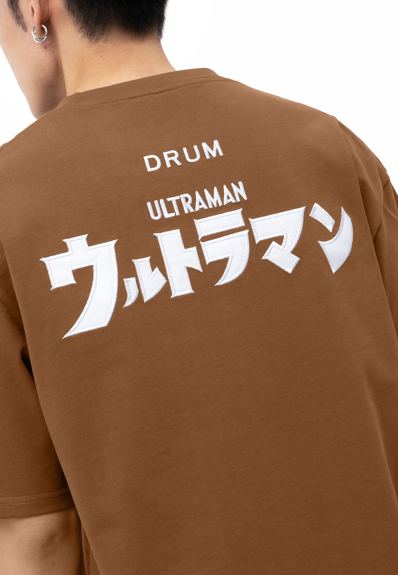 DRUM | ULTRAMAN Flocking Details Oversized Tee- Brown