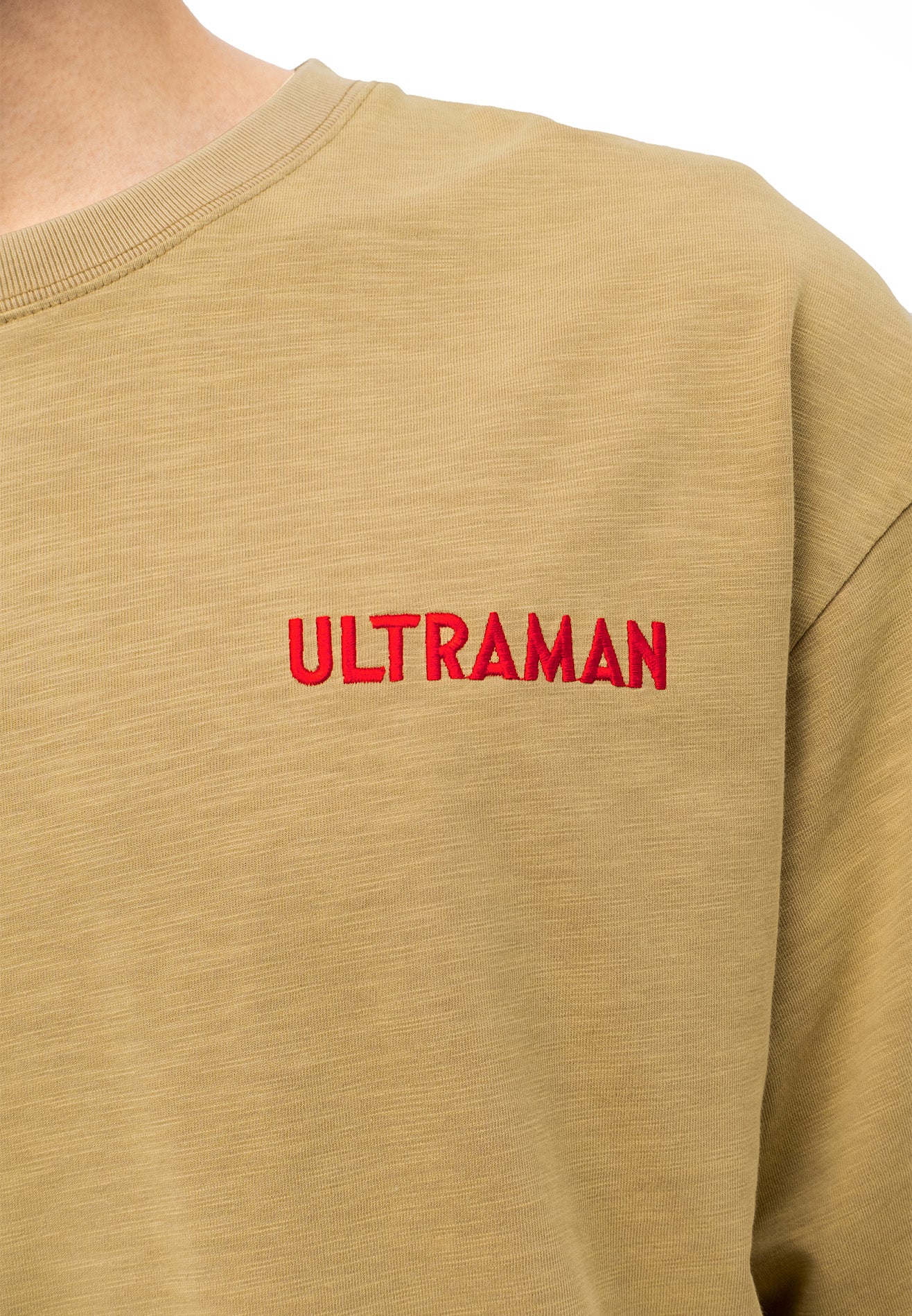DRUM | ULTRAMAN Photoprint Stoned Washed Oversized Tee- Khaki