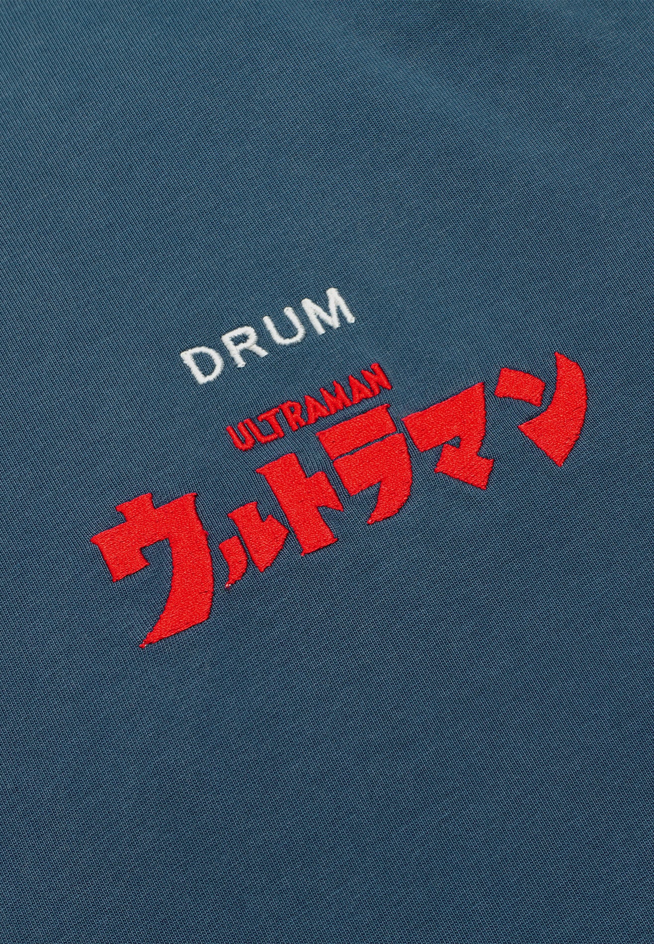 DRUM | ULTRAMAN Hibiscus Embroidery Stoned Washed Oversized Tee- Blue