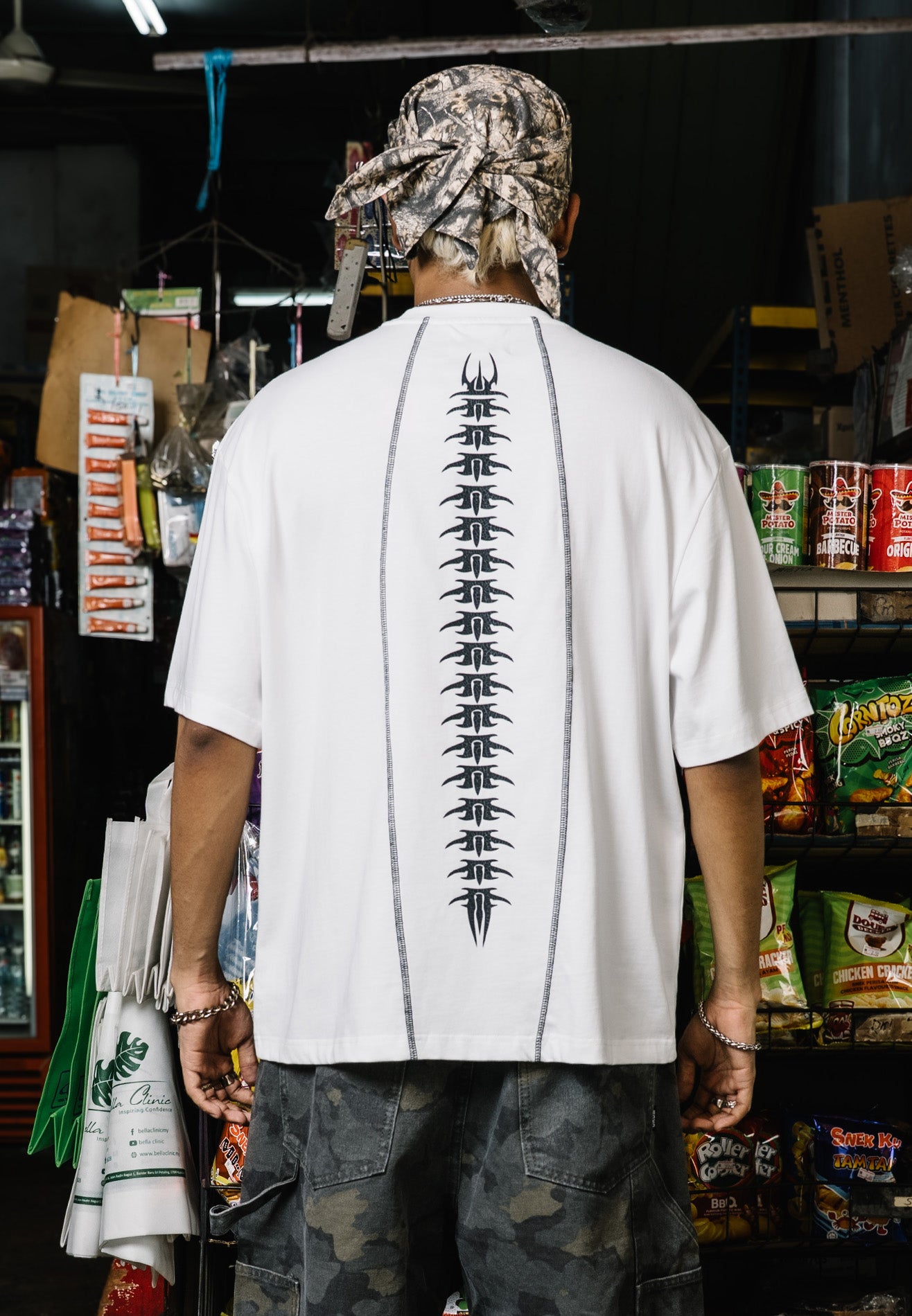 DRUM X AOS Trible Graphic Cracking Rubber Print Oversized Tee- White