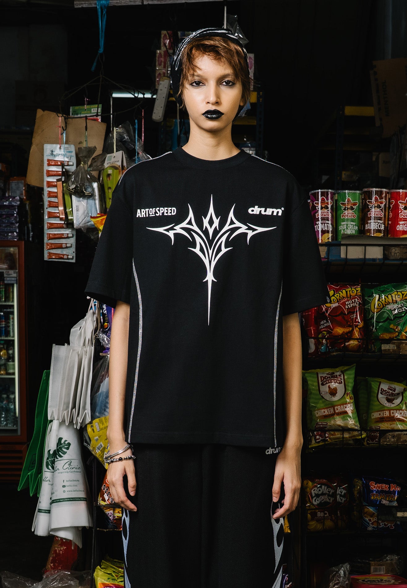 DRUM X AOS Trible Graphic Cracking Rubber Print Oversized Tee- Black