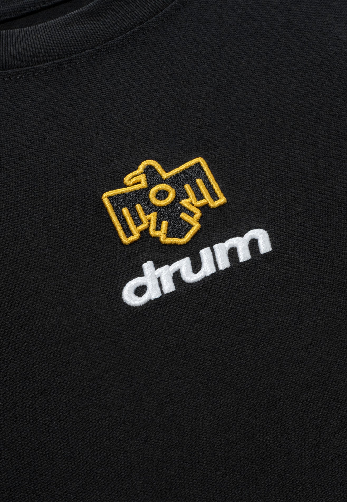 DRUM X AOS Logo Embroidery Trible Graphic Cracking Rubber Print Oversized Tee- Black