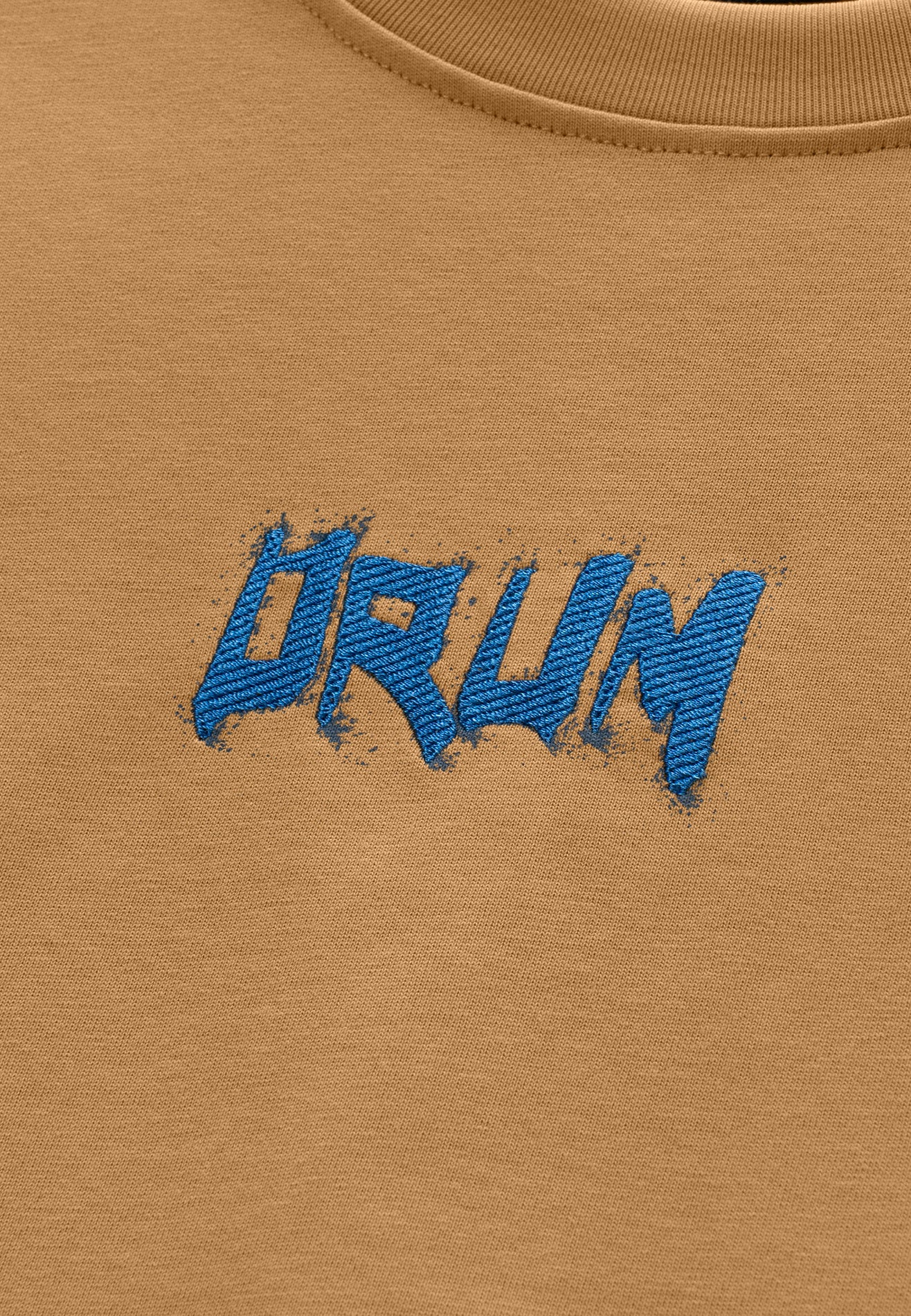 DRUM S. Slogan Hi-Density Print Oversized Boxy Tee- Light Khaki