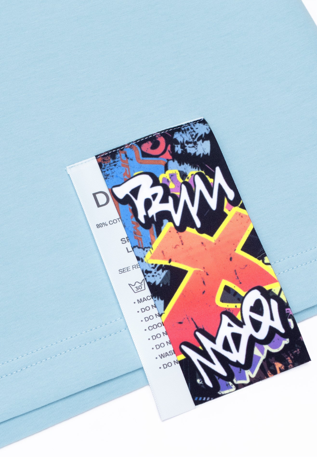 DRUM X MAQ I Got A Story Graffiti Oversized Tee- Light Blue