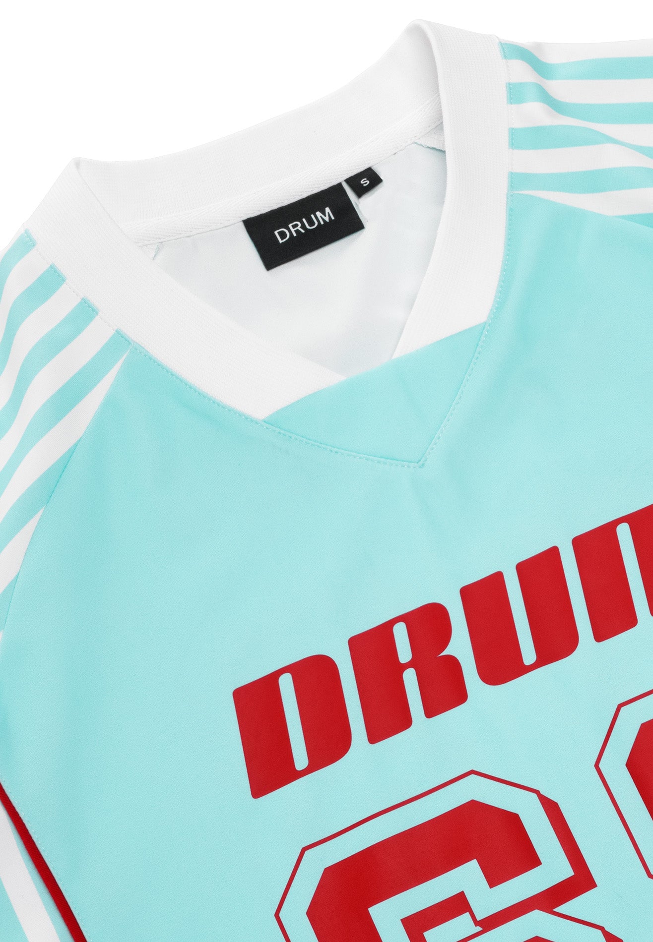 DRUM S. Ladies Digital Print Jersey Top - Light Blue